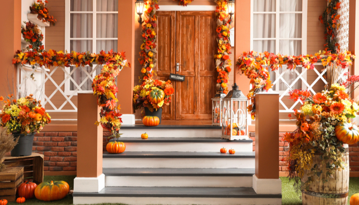 Porch or house entrance decorated for halloween or traditional fall holidays