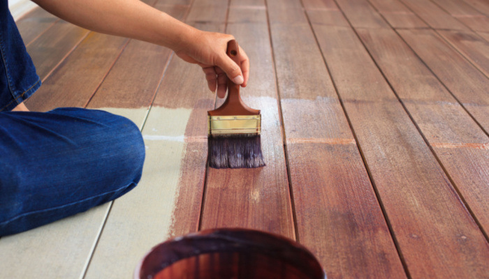 hand painting oil color on wood deck floor use for home decorated ,house renovation and housing construction